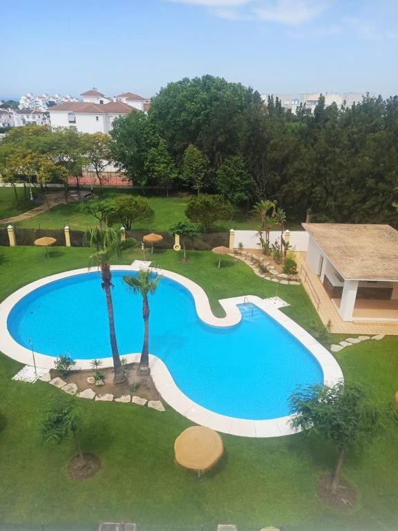 Fantástico ático con terraza, garaje, wifi, con todo para playa, piscina y casa y no facturar maletas! El Portil Exterior foto